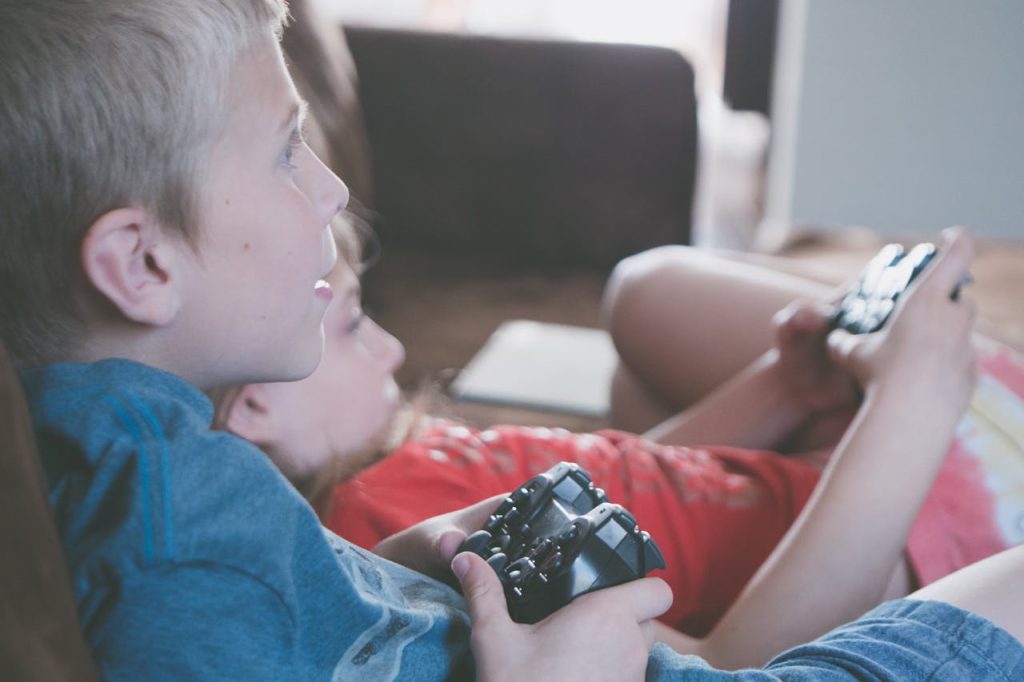 kids playing video games in an online gaming tournament for fundraising ideas for kids