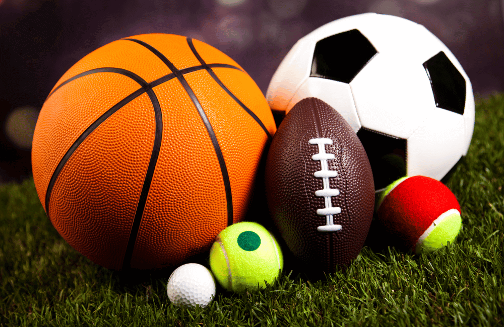 Basketball, soccer ball, football, golf ball, and two tennis balls