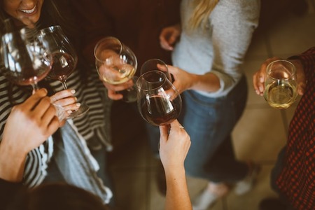 people drinking wine while networking for BBBS peer-to-peer campaign ideas